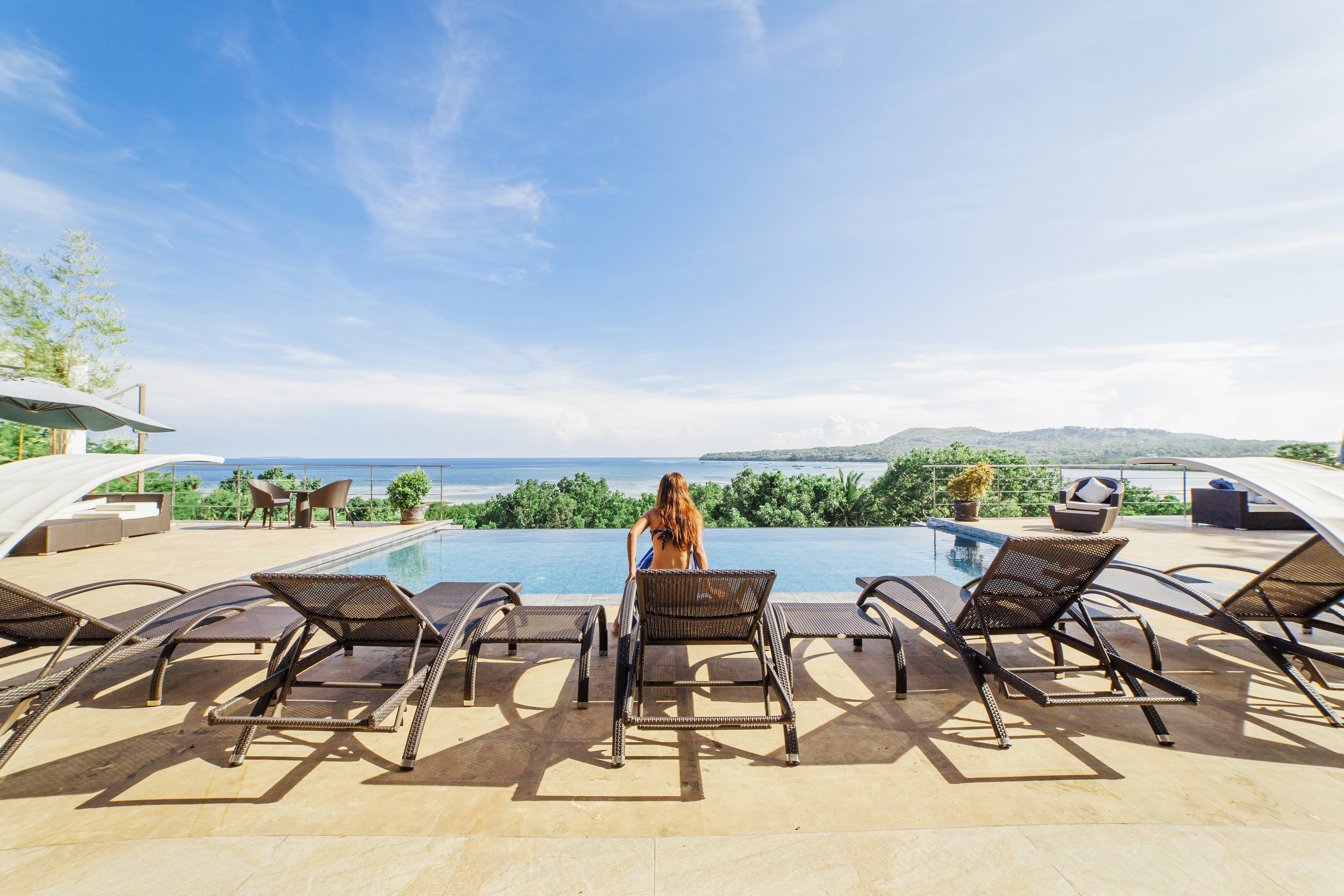Ocean Suites Bohol — infinity pool and sea view
